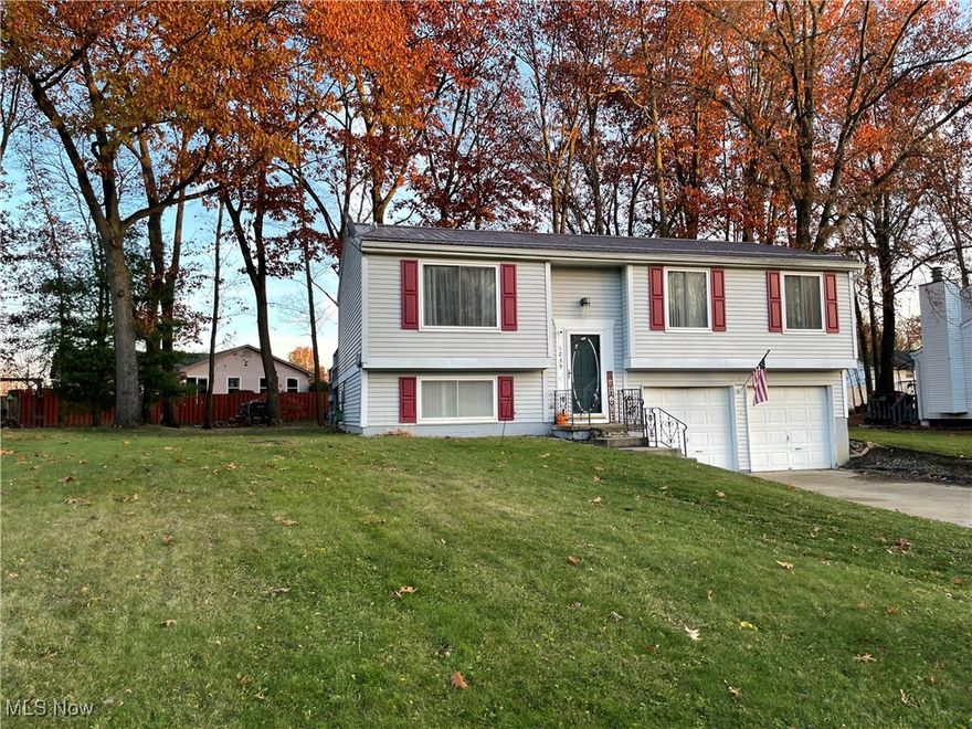 Make your appointment today to see this lovely home in Mineral Ridge Ohio.  It features new berber carpet this year in the 3-4 bedroom home with 1.5 baths.  There is also an attached 2 car garage anda newer 10 x12 shed in the spacious backyard.  The roof on the home was updated in 2023 and home also features newer HVAC system, kitchen appliances and washer/dryer.  In 2024 owner installed new ceiling fans, hot water tank and main bath with new fixtures and countertop.  Seller is open to a seller financing option.