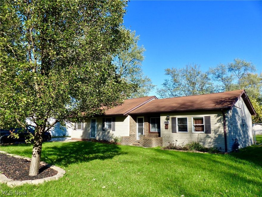 Easy one floor living, Ranch with front brick patio and vinyl siding, large great room with dining area, laminate flooring and corner brick fireplace, sliding doors to 21 x 12 deck, oak kitchen with ceramic flooring, all appliances and oversize counter serving or workspace, 3 bedrooms with fans, remodeled full bath with tub enclosure in 2019, Central air, heated 2 1/2 car garage, fenced yard, brick walkway, 12 month home warranty