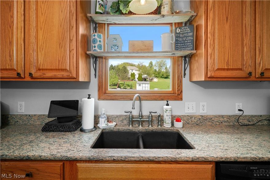 This absolutely BEAUTIFUL, 4 bedroom, 2.5 bath, 2 car Garage sitting on .50 acre. Master suite w/vaulted ceiling and 2 walk-in closets supplies a nice get away for a quiet evening. Gorgeous gourmet kitchen with granite counter-tops along with a separate breakfast bar give plenty of seating room. Pella windows, brick facade and deck give a quality built feel to this Dutch Heritage Home. Tastefully decorated and so well maintained. Finished insulated basement adding about 1,000 sq.ft. of living space. First floor laundry room. Great back deck with composite material and new deck railing, making it virtually maintenance free was added in 2018. Home has a whole house water filter which was installed in 2015. All flooring on the first floor was replaced in 2016. 1/2 bath was updated in 2016. New Air Conditioning unit was installed in 2018. Roof was replaced in 2019. The storage room just had storage shelving added in 2021 and the 2nd. floor bath flooring was replaced in 2022.This is a must see on your list!! Definitely won't last. Bike Racks, Tool Rack & Shelves in the garage do not transfer with sale.