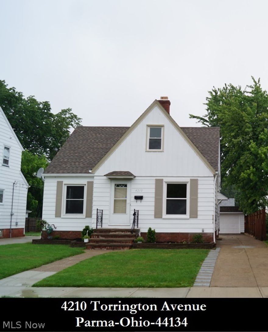 Completely updated 3/4 bedroom is ready to move right in! Newly Remodeled 16x10 kitchen with new counter-tops - new cabinetry - new Ceramica flooring - new appliances including microwave, range oven, dishwasher & refrigerator! Newly remodeled main bath! Freshly painted interior & new carpet - new electrical circuit breaker panel - new light fixtures! Newer energy-efficient vinyl replacement windows throughout & insulated entry doors! Enclosed porch off 1st floor bedroom! Huge flagstone patio, security system and 1 car garage with automatic opener! 1 year $390 America's Preferred Home Warranty is included! This meticulous gem must be seen!