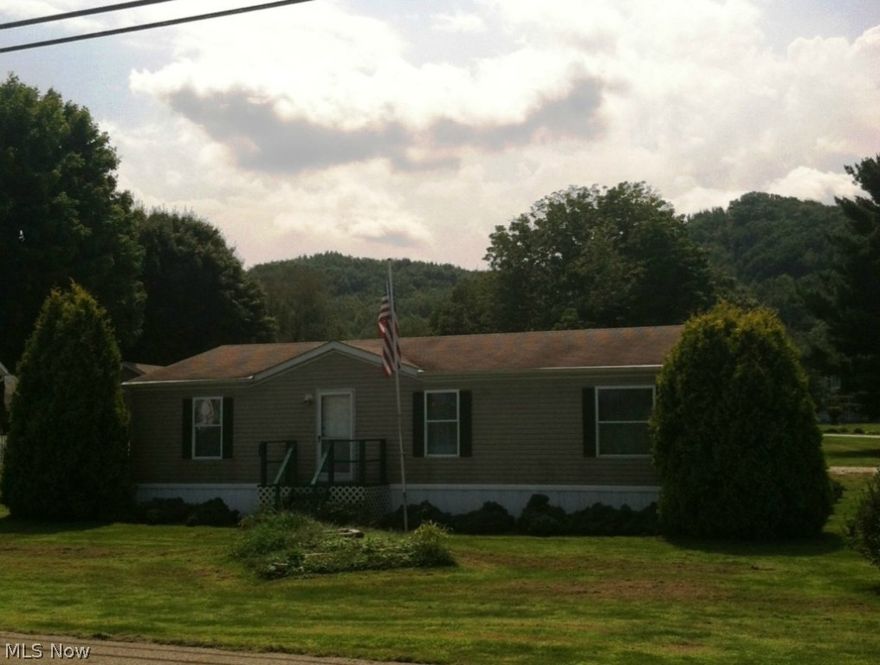 1996 manufactured home located on just under an acre lot between Newcomerstown and West Lafayette.  3BR/2BA with a 2 car detached garage.  Home is in excellent condition and ready for you to call home.  Call for a private showing today.