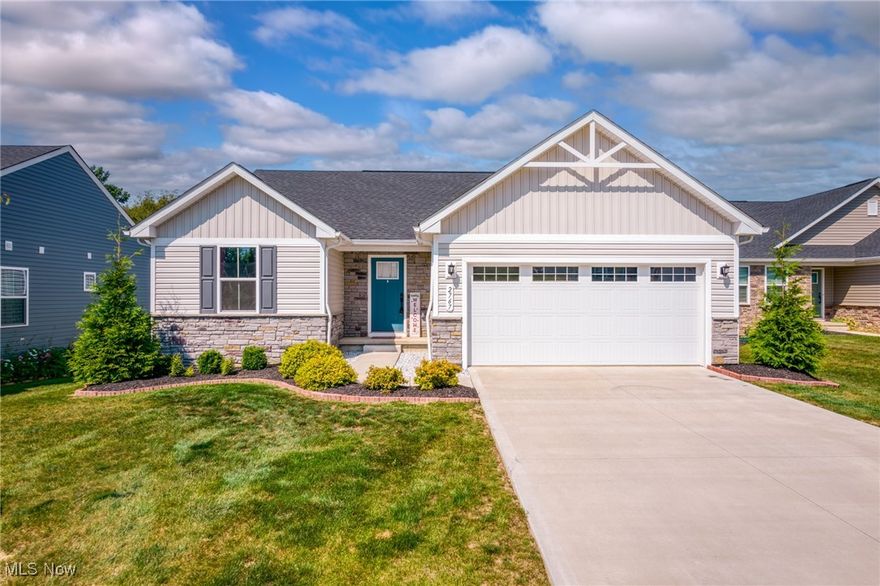 Outstanding opportunity to make your move to the charming Cider Ridge Ranches in Norton. This low maintenance move in ready Ranch home was recently built in 2022 with many of the builder upgrades. The bright open concept kitchen area leads you to the panoramic views of nature and a dog park coming very soon. Also featured in the kitchen is beautiful granite countertops, GE stainless steel appliances, and a large island for all of your hosting needs. This home offers 3 bedrooms, 2 full baths, and a 2-car garage. The primary suite offers privacy in a separate wing of the home, an enormous walk-in closet, and an en suite full bath with the laundry room conveniently just steps away.  The lower level offers ample space with the bathroom plumbing roughed in ready to finish and make it your own. This home offers exceptional peace of mind and carefree, low maintenance living in desirable Norton. Pre-Listing inspection available, please contact agent for details.