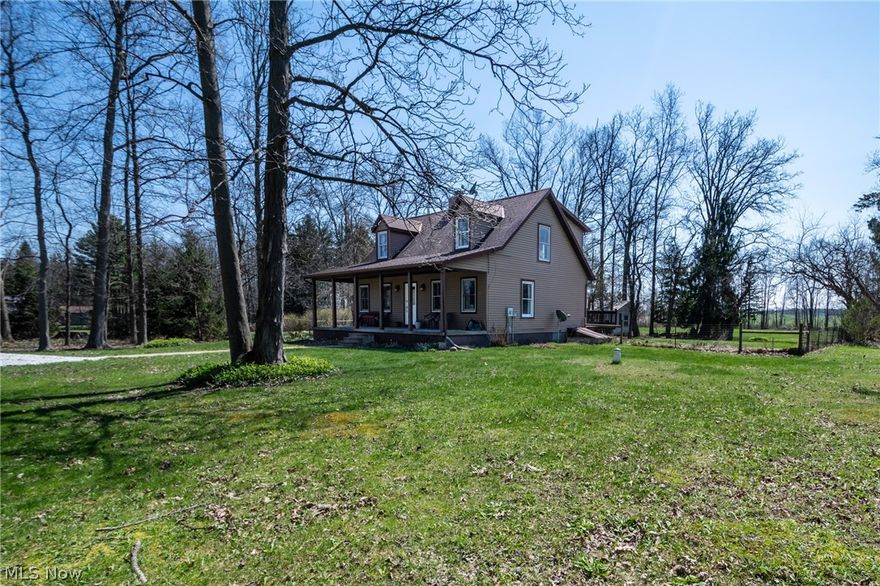 Welcome to this well-maintained 3-bedroom, 2-bath Cape Cod situated on 2 acres in Berkshire School District. Set slightly off the road with easy access to nearby amenities, this property offers a great balance of space and convenience.

The main floor features a functional layout with a connected living, dining, and kitchen area, along with a first-floor bedroom, full bathroom, and laundry. Upstairs includes two additional bedrooms and an updated full bath.

Recent updates include LVP flooring in the kitchen, dining, laundry, and bathrooms, along with updated bathrooms throughout. The home is equipped with efficient natural gas heat and central A/C for year-round comfort.

The full walkout basement is heated provides excellent storage and potential for additional living space. Outside, enjoy the covered front porch spanning the front of the home and a rear deck overlooking the property.

Additional features include a fenced yard (over an acre), established asparagus and berry garden, a lawn mower shed that stays, and a secondary outbuilding with potential for future use.

Move-in ready and offering a combination of acreage, functionality, and updates—this is a great opportunity for a first-time buyer or someone looking to simplify without giving up space.