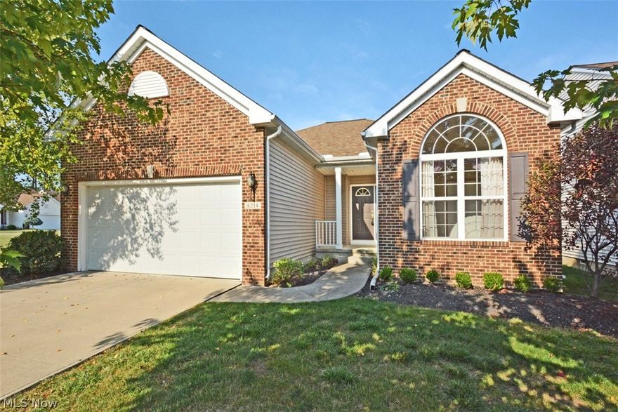 Stylish one floor living at its best! This home sits on a premium lot in the desirable Lifestyle Community of Villas of Stone Creek.  Next door is open green space and behind this beautiful ranch home is open yard space.  This move-in-ready Lexington floor plan is a former Oster Model with upgraded Low E windows, gleaming hardwood floors in dining, foyer and kitchen, ceramic in master bath, kitchen with recessed and pendant lighting. Need more room? Check out the full basement just waiting to be finished.  For peace of mind the sump pump was replaced in 2012.  Come home every day to relaxation and no yard work.  Close to I-90, I-80 and I-480 for quick commutes.