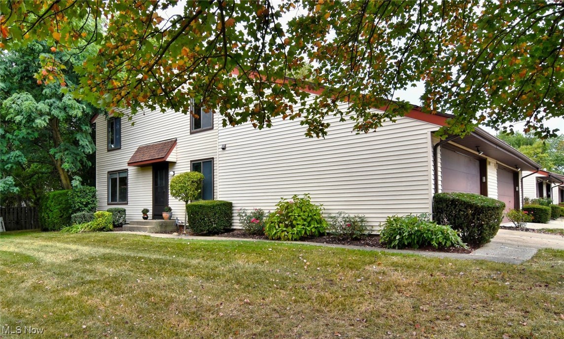 Rare and highly sought-after 3-bedroom, 2 full baths, and 2 half baths end unit in Liberty Hills. New carpeting has been installed on the main level and the basement recreation room. Large family room features a classic brick fireplace with a wood-burning insert. Glass patio sliders lead to a private concrete patio surrounded by trees. The semi-formal dining room, with chair rail and crown molding, is open to the fully equipped kitchen, which includes a pantry and plenty of dark wood cabinets. Appliances are included. Upstairs, you'll find three good-sized bedrooms, including the spacious primary suite with a private deck, walk-in closet, and an ensuite full bath. The second full bath is also upstairs. The full basement is half-finished, with new paint and carpeting, recessed lights, and a half bath. The two-car attached garage features durable, premium $5,000 epoxy flooring. The seller has generously offered a 1-year home warranty for the buyer. This property is close to schools, shopping, and the highway. Solon has been considered a top school district in the state for years. This is easy to show and available immediately. Call today to schedule a showing!