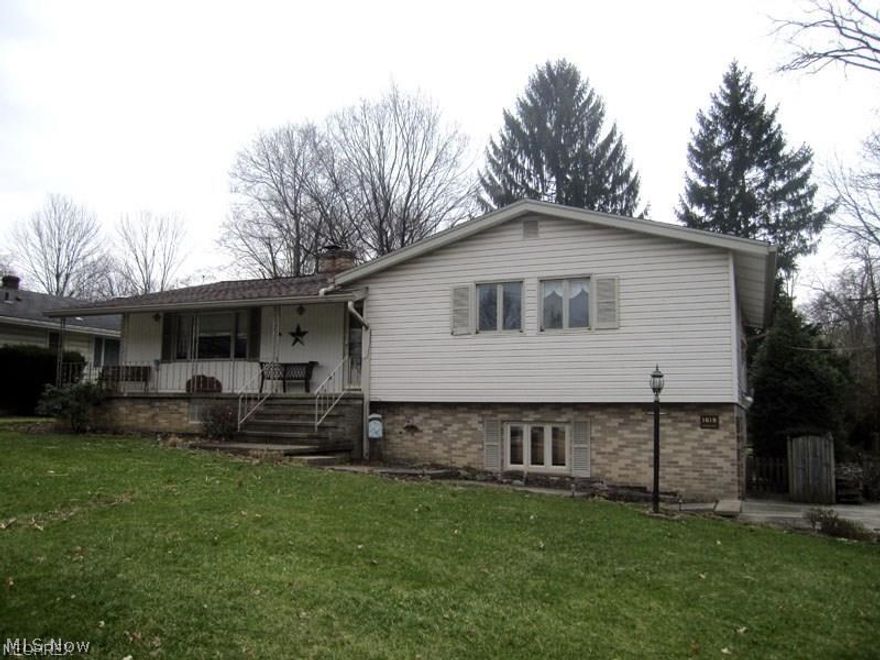 Mid Century Modern 2 story with dramatic vaulted ceilings & beautiful hardwood floors on 1st floor even under bedroom carpets. Huge eat-in kitchen w/newer laminate floor and 2 finished areas on lower level. 3 full baths, new countertops and new roof in 2007.
