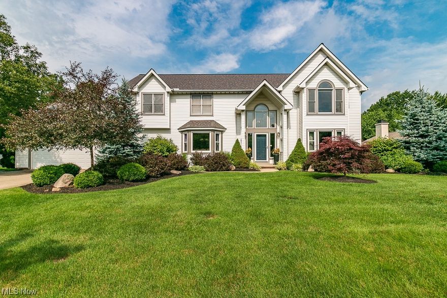 Welcome to this beautifully updated and meticulously kept 4 bedroom, 3.5 bath colonial on a half acre in Highland Heights! This home has it all, nothing left to do but move in! Open the door to the two-story foyer with gorgeous Mirage Maple hardwood floors that flow through most of the main floor. Updated eat-in kitchen includes granite counters, Cabinet Specialties fine custom solid maple cabinets, double sink, island, ss appliances, pantry & glass door out to the back deck and private yard. Step down into the cozy two-story great room with soaring ceilings, wall of windows, beautiful mantel, gas fireplace, & another glass door out to the backyard. Large formal dining room with beautiful ceiling, bay window, Hunter Douglas blinds - great space for holidays and family dinners! Main floor also offers living room, den/office with built-in cabinets, desks, and coffered ceiling, updated full bath with stall shower & laundry/mudroom with storage and coat closet to round out the first floor. Head upstairs to the owner's suite with vaulted ceiling, tons of natural light, 2 walk-in closets with built-in shelving, bathroom with jetted tub, stall shower, skylights, and double sinks. Three additional nice-sized bedrooms, another full bath with tub/shower, and large hall linen closet complete the upstairs. Fully finished lower level includes a large media room, surround sound system, game room, custom bar, tons of storage, updated half bath, and exercise room. This home is a must see!