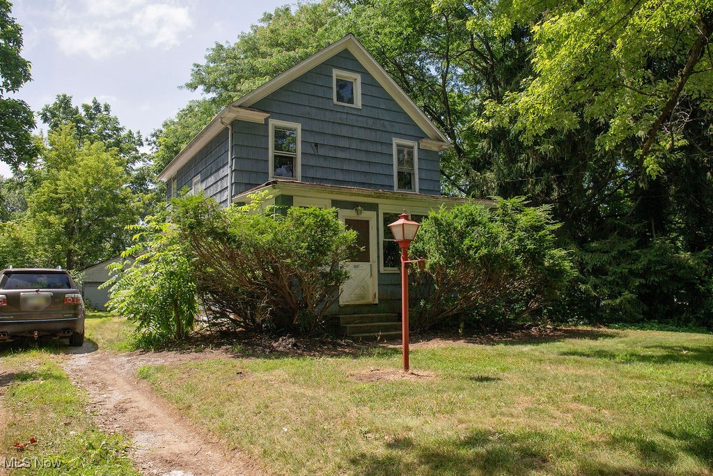 Welcome to 5947 Washington Blvd in Saybrook! This charming 3-bedroom, 1-bath colonial offers 1,455 square feet of living space with plenty of character and potential. Built in 1920, the home features a spacious kitchen, inviting living and dining areas, and an enclosed front porch. With its classic layout and solid structure, this home provides a great opportunity for updates and personal touches. Whether you're looking to invest or create your dream space, this property offers the flexibility to make it your own. With a bit of vision, this home can truly shine!