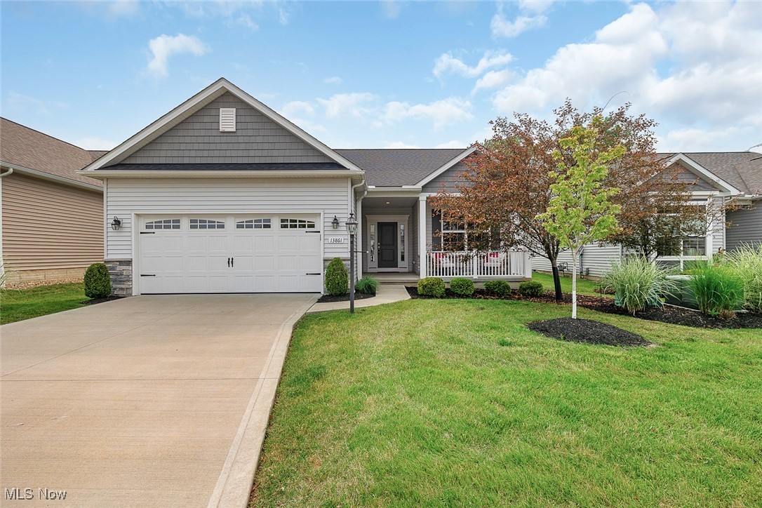 Welcome to this beautifully maintained ranch-style cluster home built in 2019 by Kensington Homes, offering modern design, quality craftsmanship, and energy-efficient features throughout. This 3-bedroom, 2-bath residence showcases a sought-after open floor plan and stylish upgrades, all nestled on a low-maintenance homesite with a $145/month fee that includes lawn care and snow removal. Enjoy charming curb appeal with a welcoming front porch and a screened-in back deck—perfect for relaxing evenings. A light-filled morning room just off the dining area provides a versatile space ideal for entertaining or everyday lounging. The open-concept kitchen is equipped with white cabinetry, granite countertops, a large island, under-cabinet lighting, a tile backsplash, and GE stainless steel Energy Star appliances including the range, microwave, and dishwasher. Luxury vinyl plank flooring flows through the main living spaces, creating a seamless and durable finish. The great room is centered around a gas fireplace with a custom wood mantle and tile surround, offering both warmth and style. A convenient laundry room with pocket door access is located just off the garage. The spacious primary suite features a tray ceiling, a private bath with double sinks, a linen closet, and a generous walk-in closet. The third bedroom, with oversized double doors, functions perfectly as a home office or den. A full basement with full bathroom plumbing rough-in offers future finishing potential. Built with energy efficiency in mind, the home includes a poured wall foundation, 95% high-efficiency Trane furnace, and a programmable thermostat. This property combines timeless comfort with today’s trends—ready for its next owner to move right in.