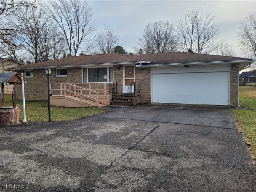 A great opportunity awaits in this 3-bedroom brick ranch situated on just under an acre of land. The home offers a spacious eat-in kitchen with island, re-surfaced cabinets, and sliders leading to the covered patio.  The spacious living room perfect for relaxing and entertaining has an abundance of natural light and a beautiful hardwood floor.  The three nice size bedrooms all are with hardwood floors, plus you will find two full baths.  The open full basement includes laundry and workshop areas and offers a great opportunity to add additional living space. The attached 2 car garage is heated with storage, a workspace, shelving and water.  Head out to the large backyard and find the covered deck along with an additional 2 car garage and utility shed.  Conveniently located in the heart of Strongsville, close to SouthPark Mall, shopping, restaurants, schools and I-71. Bring your own style and make this home yours today.