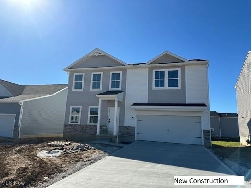 Welcome to 377 Golden Apple Drive NE, Homesite 38, in Louisville's newest community, Orchard Park! This Water Lily floorplan is move-in ready by October 2024 and is styled in our designer-curated Farmhouse Look. The home features a cozy home office, an extra suite, and a second-floor loft, providing versatile spaces for work, guests, and relaxation.

The gorgeous kitchen boasts Elkins cabinets with burlap floating shelves and a vast island with elegant Meridian Gray quartz countertops. The refined dining area and great room are perfect for indoor entertaining. The spacious primary suite includes a luxurious bath with dual sinks and matte black accents. Additionally, the finished basement offers a versatile recreation room and bath, adding to the home's ample living space.

Conveniently located just minutes from Rt 62 and I77, this community combines the ease of access to necessities with the charm of Louisville's small-town atmosphere. Enjoy the peace of mind that comes with owning a home under warranty.