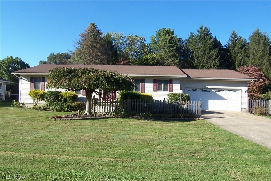 Stunning open floor plan! Beamed vaulted ceiling connecting sunken great room w/slider to deck, woodburning fireplace and kitchen with newer stainless appliances and dining area! Laundry is plumbed in master bed closet for stackable as well as in basement! Master bath w/double sinks! 4th bedroom in basement with rec room! New front door ordered and will be installed! Roof 2007 and vinyl siding 2008! Quite dead end street and private deck overlooking peaceful back yard w/shed! Central vac has been removed. Nice!