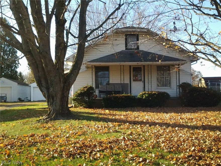 Nice home sitting on .61 acres 2 bedrooms on the main floor and 1 large bath, with a large eat in kitchen, 2 rooms upstairs that needs some tlc could be 2 more bedrooms . Glider on front porch & window air conditioner stays. Seller said that she believes there is hardwood floor under the carpet in bedrooms and living room on the first floor. Hot water heater 6 months old, some new plumbing in basement. Central Air unit outside but doesn't work.