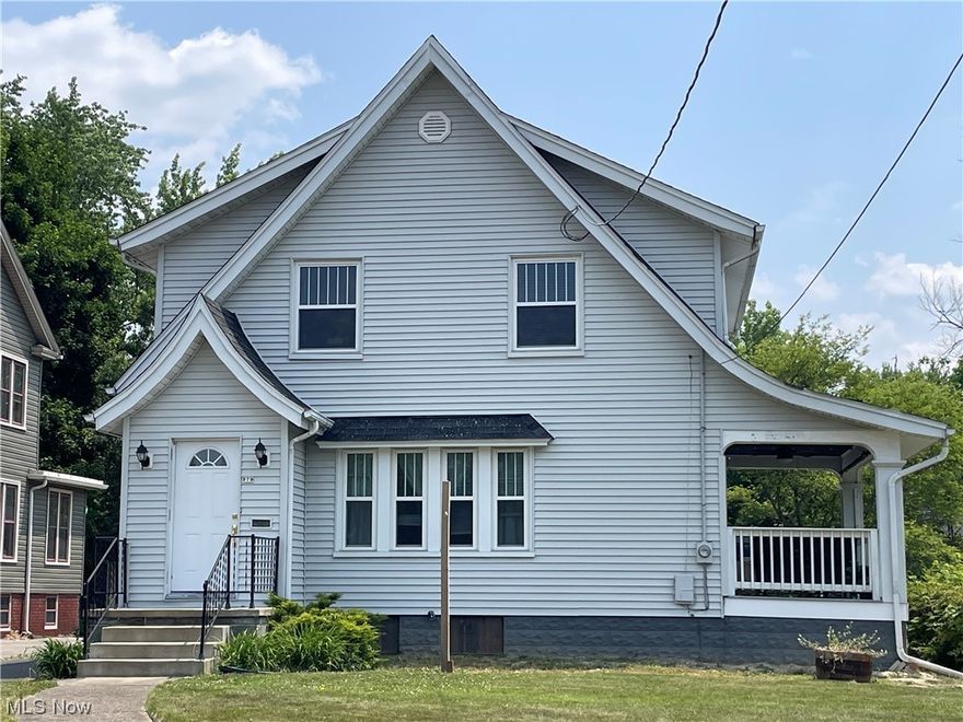 Great Starter Home!!!  Great Rental Property!!  Home Warranty!!  Happy 4 bedroom, 2 bath home with extra room in the basement.  Home is spacious with lots of natural light.  Extra "built-ins" which only adds to its charm.  Hardwood floors upstairs.  Come make an offer before it's gone!!!
