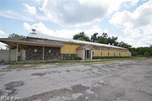 Potential Seller Financing. Former 6883 sf Firehouse Restaurant on 1.45 acres located in Creston, Ohio on the south side of town located on busy State Route 3 (S.Main Street). Lots of parking and outside seating . Detached garage with overhead door in back of restaurant.