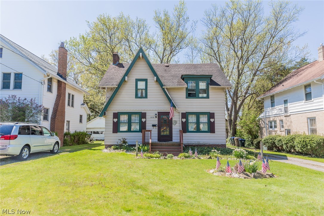 This charming traditional colonial is located in a sought after neighborhood and convenient to shopping & restaurants. This Seller is looking for the right Buyers that will recognize both the value of location and the potential this home has to offer. The kitchen is a highlight with loads of natural light and plenty of cabinetry thanks to an addition in back of kitchen. Both kitchen and bath on second floor have newer replacement windows. The other living space is grand and living room features a wood burning fireplace. There are hardwood floors under carpet in most areas. All the appliances will stay with property including washer & dryer. Seller has faithfully kept up with maintenance on Furnace and Central Air. A 1 year Home Warranty is being offered by this Seller from Americas Preferred Home Warranties. Enjoy all that Cuyahoga Falls has to offer including a savings on city utilities & amenities offered with Parks and Recreation, including the Natatorium Health Club.