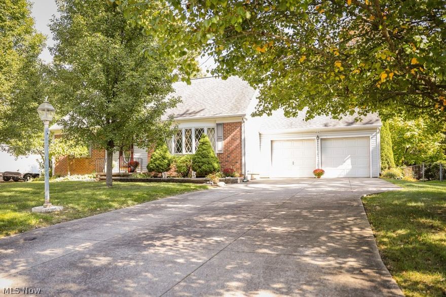 Welcome to 4142 Siefer Dr in beautiful Rootstown Ohio.  This is a cape cod style home that features 4 bedrooms, 2 full baths, with almost 1700 sq. ft of living space.  As you walk in the front door you will notice the good sized living room with a large picture window that allows an abundance of natural light.  As you walk through the living room you will see the very large eat in kitchen that has been remodeled in recent years with a ton of cabinet and countertop space.  The appliances all stay with the sale of the home.  There are two decent sized bedrooms on the main floor with original hardwood floors that have been refinished in the last few years, and a full bath on the main floor.  As you make your way upstairs there are two very large bedrooms and both of them have refinished original hard wood floors.  There is also another full bath on the 2nd floor.  There is a very large unfinished basement that is dry and has been waterproofed all the way around the basement.  This area co