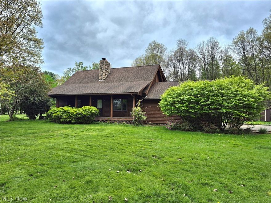 Rustic 3 Bedroom Log Home situated on 2.29 Acres w/1755 Sq. Ft.  All city utilities. Home features a Two-Story Great room with woodburning fireplace. Large Eat In Kitchen w/center island and appliances. 2 Bedrooms on main level w/full bath. Large Bedroom upstairs w/full bath. Spacious Loft overlooking the main floor. Full basement w/laundry area. Sump pump w/battery backup. Lots of storage! Large front porch plus a deck off the back. Newer shed! Exterior of home has just been treated and stained! Newer pictures uploaded!