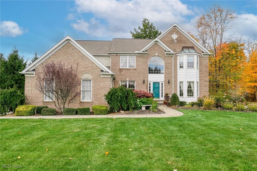 Welcome home to 5114 Bayside Lake Blvd Stow! Beautiful 4 Bedroom, 3.5 Bath Colonial on a Corner Lot. This impressive colonial offering space, style, and comfort throughout. Step inside the grand two-story foyer that opens to a stunning great room with a gas fireplace and catwalk overlooking both the foyer and living area. The home features formal living and dining rooms, a convenient first-floor office, and a large eat-in kitchen with granite countertops, a center island, and all appliances included. Upstairs, you'll find three generous bedrooms and a spacious master suite complete with a private bath. The finished basement adds even more living space with a full bath and a huge storage area perfect for hobbies, a home gym, or extra entertainment space. Enjoy outdoor living on the Trex deck or patio, complete with a gas line for your grill and a Sunsetter awning for shade. The wrought iron fenced backyard area offers a great space for pets or play. Beautiful landscaping and underground sprinkler system to keep things green throughout the summer.  The 3-car garage features hot and cold water, plus a floor drain for added convenience. Located close to shopping, restaurants, hike and bike trails. This home offers the perfect blend of elegance, function, and location!