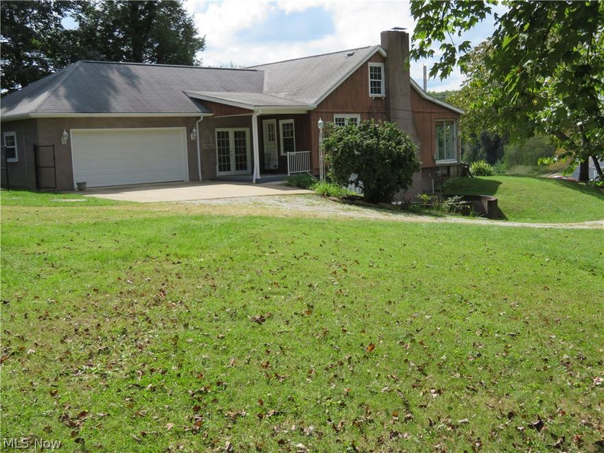 Many updates in this charming story and 1/2 country home.  Fresh paint throughout.  New fenced area for kids or animals. Bright 20x10 family/ great room is  inviting for family gathering located off kitchen dining area.  This house has a great layout and the rooms flow easily one to another. Gas Log fireplace, hardwood floors, built in corner cupboard,updated bath and so much more... Generic whole house generator, and a new septic system installed sept. 2016. two car attached garage and lots of parking available.