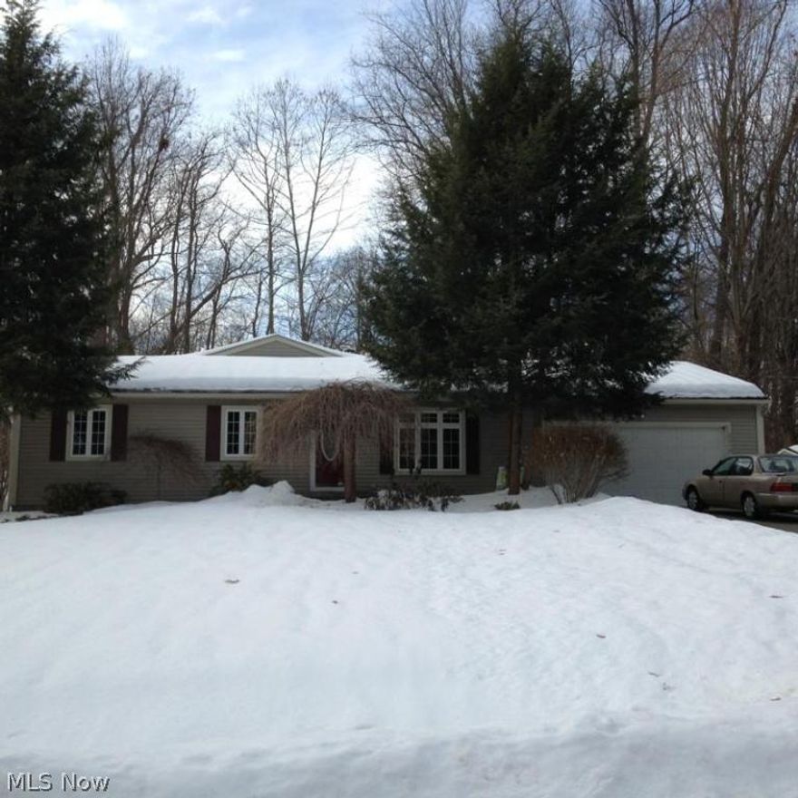 Beautiful home - immaculate & well cared for.  Private, wooded back yard. Much natural life.  Vaulted family room with stone wood burning fireplace.  Updates galore!  Beautiful hardwood flooring and trim.  Large master suite with walk-in closet, jetted tub & view of the woods.  Granite kitchen counters & breakfast bar.  Come see this lovely home, ready for new owners.  Indoor pets - please keep doors to outside closed.