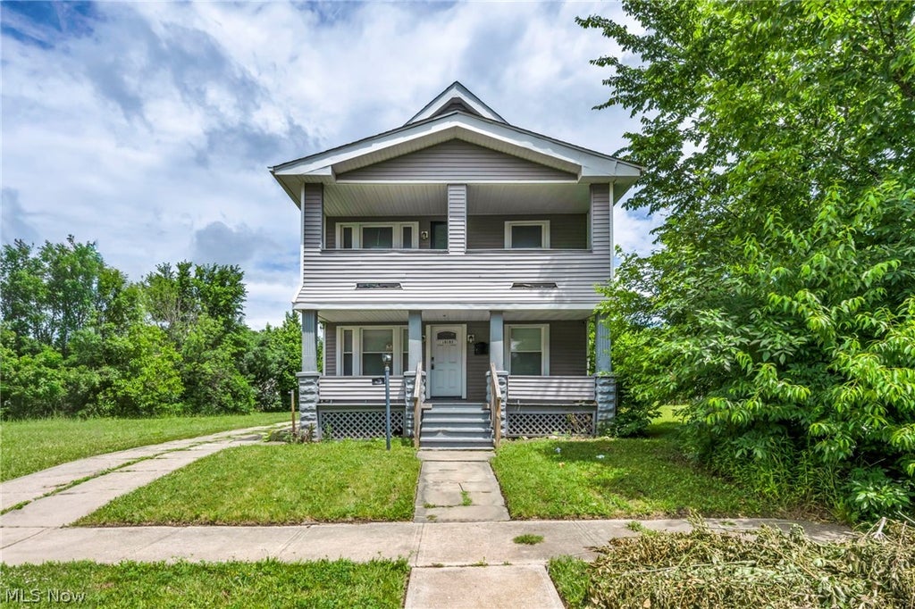 Photo of 10103 Lamontier Avenue, Cleveland, OH 44104 (MLS # 5219744)