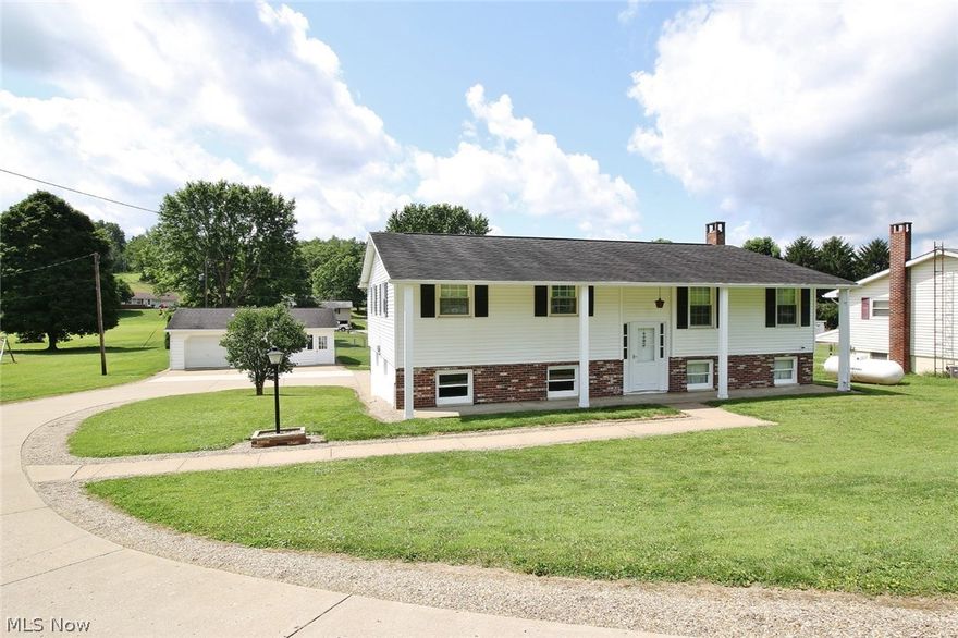 This home offers 3 bedrooms 2 bath with a large eat-in kitchen that flows on to a private deck overlooking the .half acre with a fenced in yard plus a Detached 2 and half car  garage in addition to  the 2 car attached  garage , concrete driveway .
