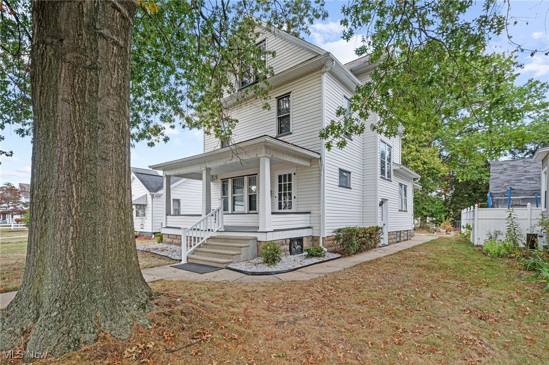 Spacious and Clean, you will find in this renovated 2 story home. Beautiful open oak stairs .Updated interior includes, new paint , light fixtures, LVT flooring thru out, bath fixtures, and new kitchen. The original wood work has been kept with its origin stain throughout the property. There is a walk up attic with potential to expand living space. Upper bath is spacious with nice storage. Laundry is on the first floor along with a new bath. The 50 x200 alley bound lot, can be used for extra parking ,enter from the back alley. Seller has surveyed the west side of the property, and lines are staked. There is a partially finished room in the basement, also has a small work shop room. Many possibilities in the lower level. Property sells with a 1 yr home warranty to the buyer. Call LA for details.
