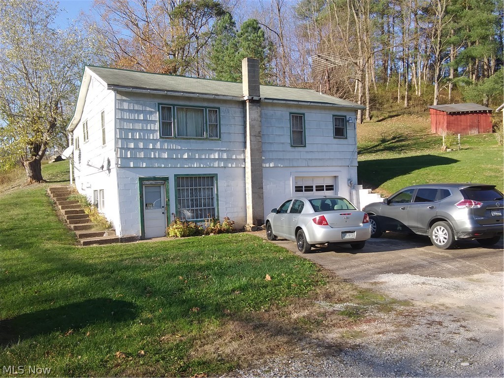 3 Bedroom ranch with basement and single car garage. Large room in basement with wood burner. This home has lots of potential, needs some TLC. Nice country setting with acreage. Being sold As is.