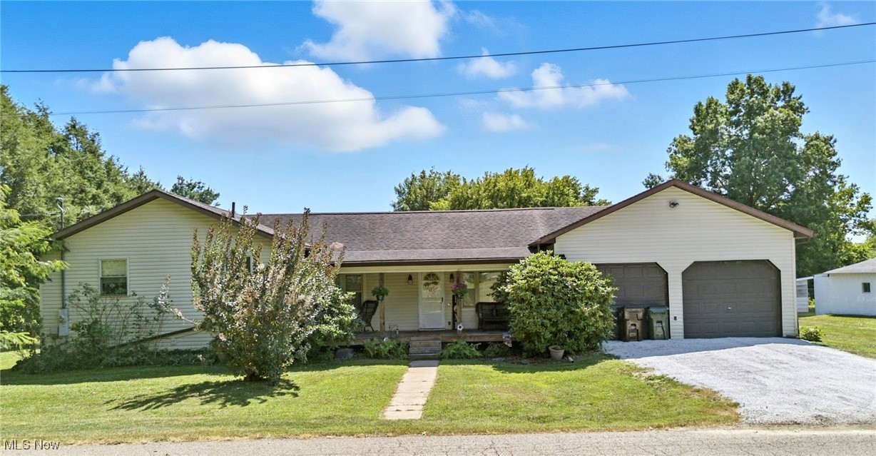 Welcome to this beautifully remodeled ranch-style home situated on three parcels in Belpre. Originally built in 1953 and completely updated with additions in 2000, this 1,720 sq ft residence offers a functional layout with bonus space in the partially finished basement. The main level features a spacious living room, a full bathroom, and an eat-in kitchen with access to the large 2–3 stall attached garage (with a third garage door at the rear) and backyard. Just three steps up from the living room, you’ll find an office, two comfortable bedrooms, and a master suite with a walk-through closet to a full bath and French doors leading to the backyard. The lower level provides additional living space, including a large finished bonus room with closet, a combined laundry/bathroom with walk-in shower, and a huge open storage area with walk-up cellar door access. Also there is a dedicated utility room that houses the HVAC and hot water heater. Outside, the home sits on three parcels with plenty of room to enjoy. A 12x10 shed offers extra storage, and the property is within walking distance to the elementary school. With its versatile layout, multiple living areas, and thoughtful updates, this property is ready to welcome its next owner.