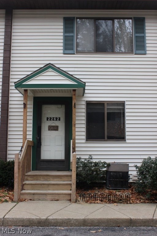 Outstanding & economical 2 bedroom, 2 bath condo in Tuscarawas Park Condos with approx. 1356SF including finished walk out lower level, wood burning fireplace, 2 car garage, many updates & low HOA fees* Ceramic entry leads to updated kitchen (2013), breakfast bar, gas range, refrig, microwave, & dishwasher* Living room and dining area with updated carpet* Lower level with family room with wood burning fireplace, newer carpet & full bath* Master with fan & updated carpet* Other updates include faucets, shower doors & paint throughout* Quiet location* Common grounds- picnic table, pavilion, walking path to Firestone Metro Park & views of Tuscarawas River* HOA fee $94/mo covering building ins., landscaping, snow removal, reserve fund, trash pick up & recreation* Convenient location* Like living in a park*