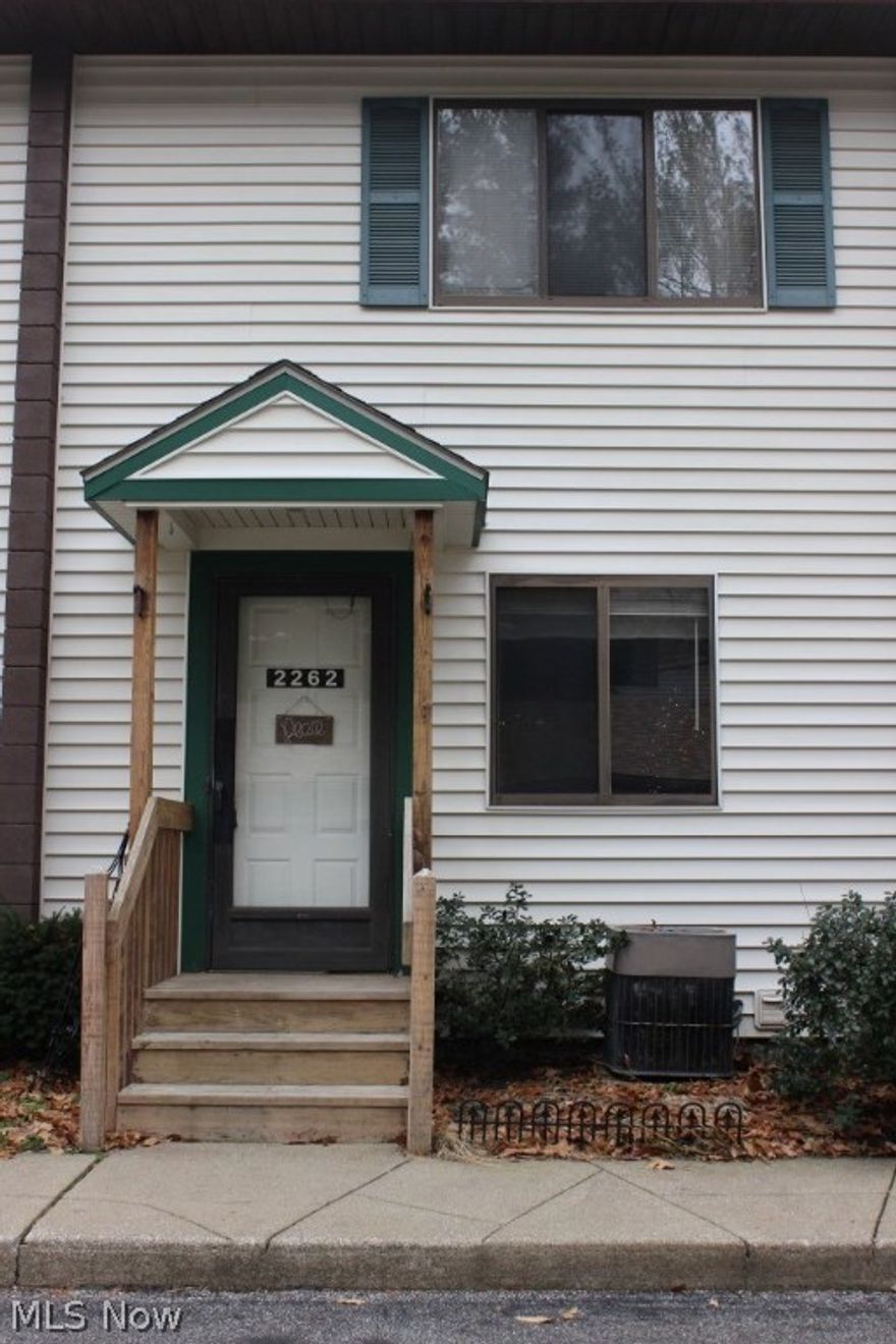 Outstanding & economical 2 bedroom, 2 bath condo in Tuscarawas Park Condos with approx. 1356SF including finished walk out lower level, wood burning fireplace, 2 car garage, many updates & low HOA fees* Ceramic entry leads to updated kitchen (2013), breakfast bar, gas range, refrig, microwave, & dishwasher* Living room and dining area with updated carpet* Lower level with family room with wood burning fireplace, newer carpet & full bath* Master with fan & updated carpet* Other updates include faucets, shower doors & paint throughout* Quiet location* Common grounds- picnic table, pavilion, walking path to Firestone Metro Park & views of Tuscarawas River* HOA fee $94/mo covering building ins., landscaping, snow removal, reserve fund, trash pick up & recreation* Convenient location* Like living in a park*