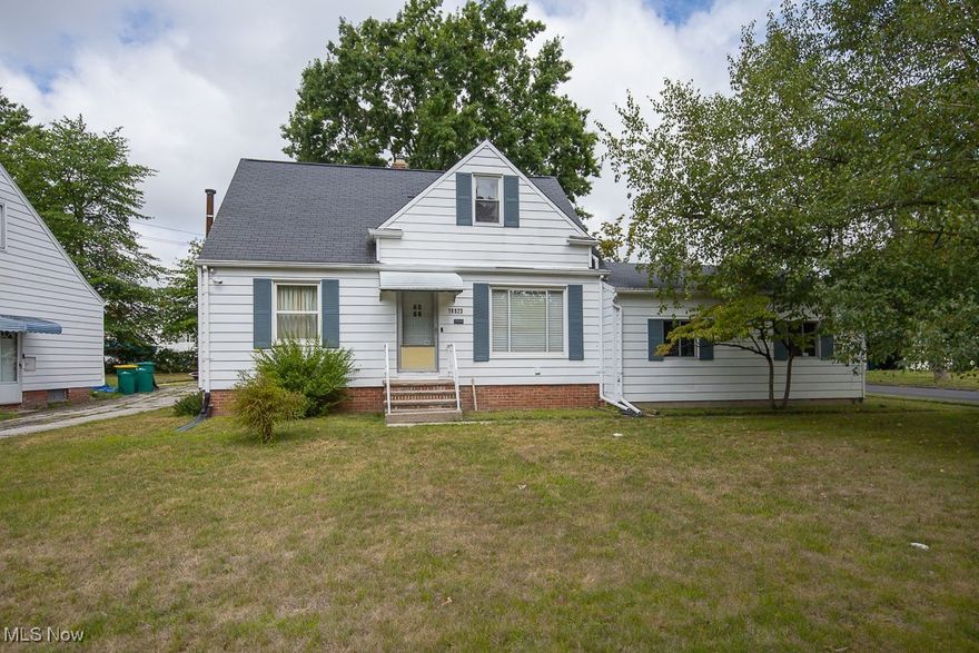 Adorable and Affordable Bungalow Nestled on a Park-Like Lot with Plenty of Room to Picnic and Play! Enjoy the Attached Two Car Garage in the Winter and an Extra Wide Driveway for Guests. There are Plenty of Wood Cabinets and Counter Space in the Kitchen. The Generous Dining Room Overlooks the Backyard. Beautiful Hardwood Floors Highlight the Living Room. Both Downstairs Bedrooms are Spacious and Features Hardwood Floors. The Main Floor Bath is Sparkling Clean and Features Ceramic Walls and Floor. Upstairs You will Find a Huge Master Bedroom with Lots of Closets and a Private Half Bath. You Will be Impressed with the Basement Rec Room Boasting Nature Stone Floors and a Wood Burning Stove. The Basement Also Provides for a Utility Room and Workshop. This is a Great Place to Call Home! Schedule Your Appointment Today!! This home is violation free and already FHA Appraised!