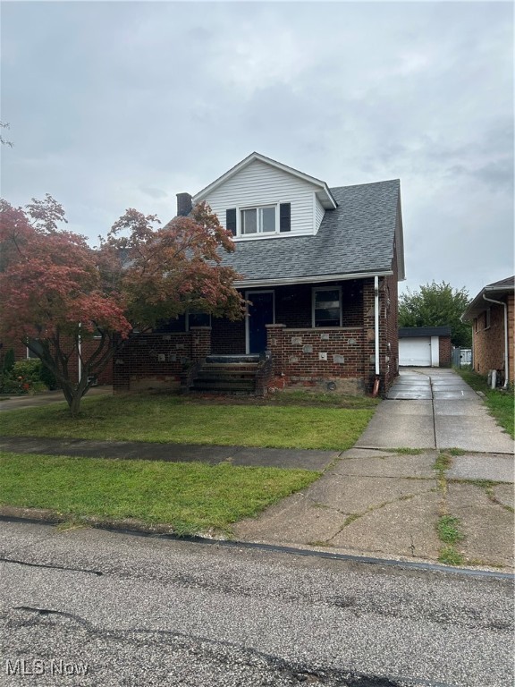 Great all brick home with 2 car block garage. Beautiful porch across front of house. Enter into large living room with fireplace and hardwood flooring. Continue into formal dining room also with hardwood and french doors leading to ground floor bedroom or office. Upstairs are 2 bedrooms with hardwood floors and full bath. Most windows replaced and roof appears newer. Finished basement with full bath. Needs some updates and just waiting for new owner.