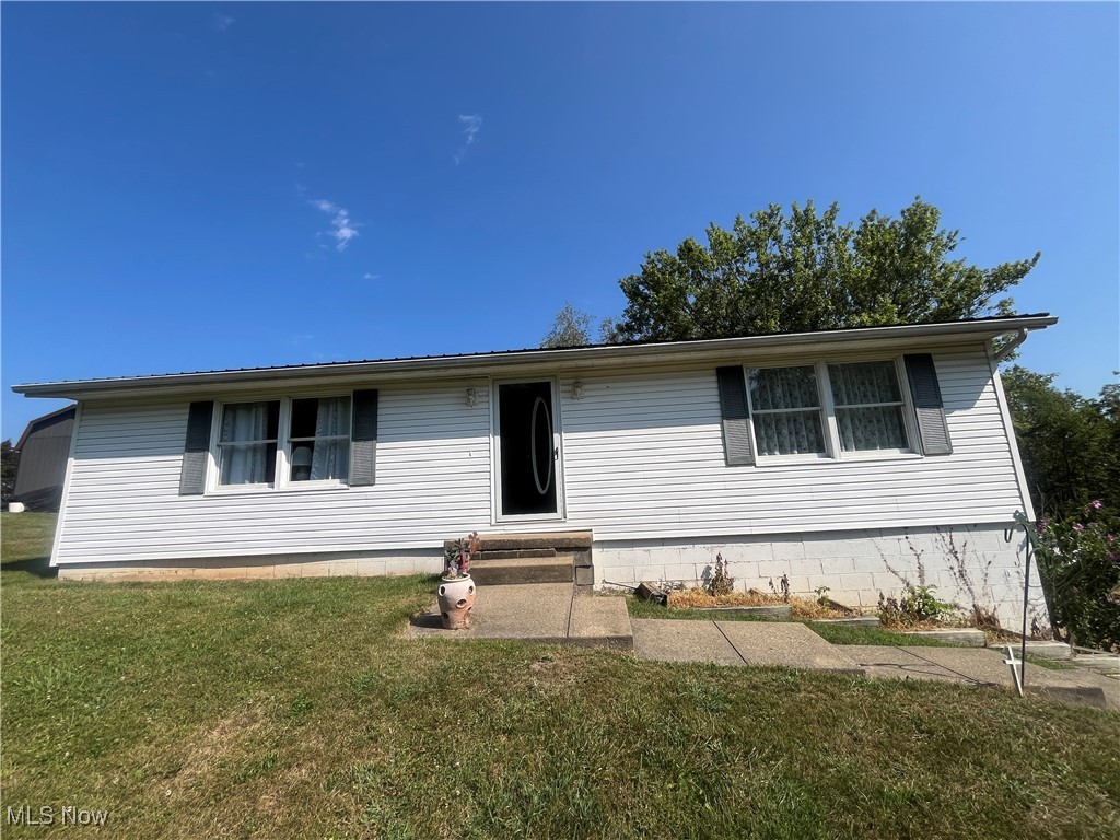 Well-Kept Ranch home in West Muskingum Schools! Home features many updates including Roof, Furnace and Central Air! Home features oversizxed living room with eat-in kitchen and first floor laundry and large pantry. Two Bedrooms and one bath, full basement with large family room at bottom of steps with carpet, utility room and a one car garage with electric door opener. Beautiful setting with deck off the back for outdoor enjoyment and an outbuilding for additional storage! Ready to move into, call today!