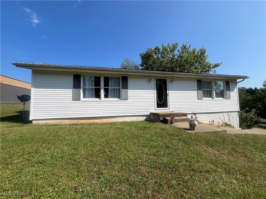 Well-Kept Ranch home in West Muskingum Schools! Home features many updates including Roof, Furnace and Central Air! Home features oversizxed living room with eat-in kitchen and first floor laundry and large pantry. Two Bedrooms and one bath, full basement with large family room at bottom of steps with carpet, utility room and a one car garage with electric door opener. Beautiful setting with deck off the back for outdoor enjoyment and an outbuilding for additional storage! Ready to move into, call today!