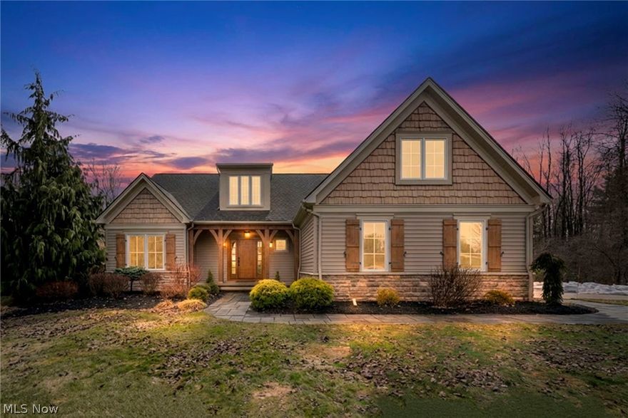 Custom-built Payne & Payne estate featuring unique Western Red Cedar post and beam timber frame construction on nearly 2.5 private acres, wooded on 3 sides with a private stream.

This meticulously updated 4-bedroom, 4,139 SF home offers a main-floor master suite, home office, wood floors, and a south-facing rear with abundant natural light. The remodeled kitchen features a double oven, cooktop, new countertops, backsplash, and appliances. All four bathrooms have been fully renovated. Two fireplaces — wood-burning in the living room and gas in the finished walkout basement. 

Major upgrades include new furnace, A/C, water heater, well pump, Kinetico water softener, central vacuum, and a whole-house generator. Outdoor living features a timber-frame screened porch with gas grill hookup, Hot Springs hot tub, natural stone terrace and walkways, and an oversized workshop with wood stove. Heated 2-car garage.

Minutes to Alpine Valley, Punderson State Park, Notre Dame Cathedral Latin, and Chardon Square.