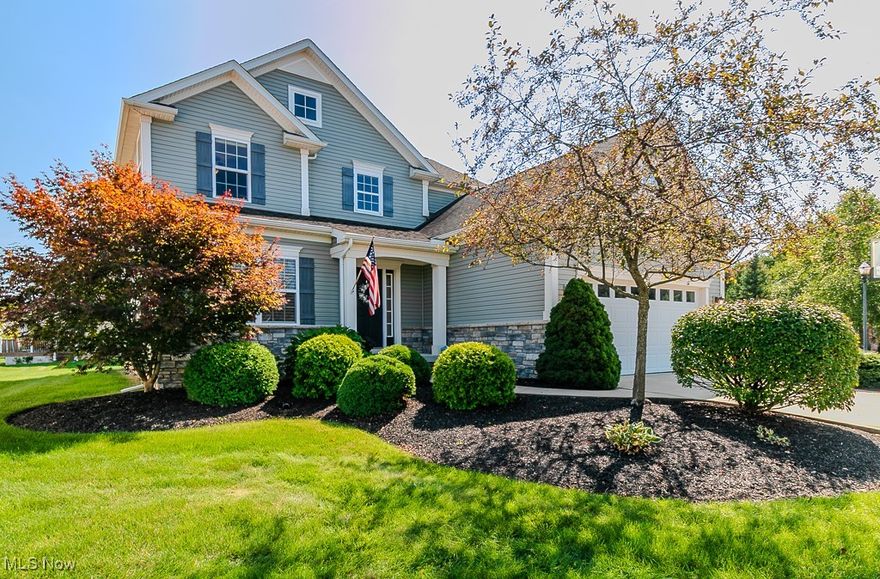 Even better in person! This Petros-built Willow layout shines with pride of ownership from its one and only owner. Better than new, it boasts a beautifully finished basement, a large screened porch, a thoughtfully updated kitchen, and an oversized corner lot. From the inviting front porch to the timeless stone-and-vinyl exterior, the curb appeal sets the tone. Step inside and you’ll appreciate the classic center-hall colonial design, paired with modern updates. The main floor offers three distinct living spaces—perfect for gathering with family and friends this holiday season. The living room provides a quiet retreat, while the dining room is spacious enough for entertaining. The family room impresses with custom built-in bookshelves, a gas fireplace with stone surround, and access to the screened back porch with dual ceiling fans. The recently renovated kitchen is a true highlight, featuring custom Kraftmaid cabinetry, Cambria quartz countertops, touchless faucet, intentional drawer storage, and a fresh, functional design complete with stainless steel appliances. A private laundry room with new cabinetry, utility sink, and storage, plus a powder room and two-car garage, complete the first floor. Upstairs, you’ll find four generously sized bedrooms, ample closet space, and two full bathrooms. The primary suite includes a large bath with soaking tub, separate shower, and walk-in closet. The finished lower level expands your living options with a recreation area, dedicated office/desk space, full bath, and even a charming custom play nook under the stairs. Outdoors, the corner lot provides extra room for play or entertaining, complete with a swing set and beautiful screened deck. Newell Creek offers a multitude of amenities, from community pool to clubhouse and playground and paved paths. This limited maintenance single family home offers the best of both worlds, especially if you do not like to cut your lawn or plow your driveway!