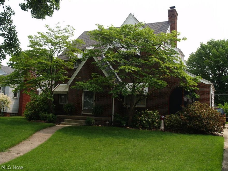 LOOKING FOR CHARM & CHARACTER IN HARTER HEIGHTS? This lovely brick Tudor with loads of charm and curb appeal was built in 1941 and has the nostalgia of the grand yester-years impact by the brick streets and lamp posts. Original hardwood floors in the Living Room, Dining Room and 3 bedrooms. Enter thru the arched door into the foyer and enjoy a spacious living room with gas fireplace and a vintage mantel that leads to a newly re-screened porch. Fully applianced kitchen with tile flooring. 2nd story offers full bath, master bedroom with hardwood floors and walk-in closet. Beautifully landscaped yard with storage shed. This charming home will not last.  A total of 7 closets throughout the home.