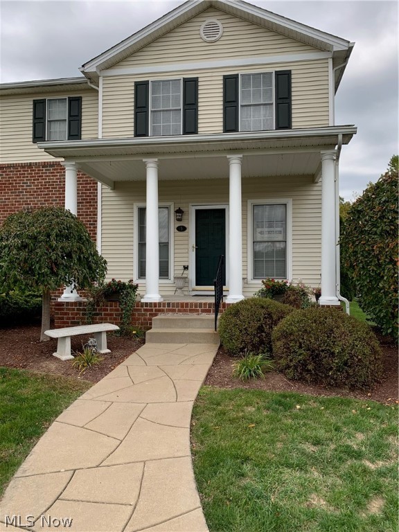 Conveniently located in the beautiful Hampton Ridge Community. This townhouse condo has two bedrooms and one and a half baths. The first floor is an open floor concept with 9 ft ceilings creating a smooth flow from the large great room to the kitchen and eating area. All stainless steel appliances in kitchen included. Spacious pantry. 1st floor laundry and mud room. Neutral colors. Covered front porch and private stone patio out back. Full basement ready to be transformed. The condo is an end unit with a large driveway and privacy. Pets allowed.