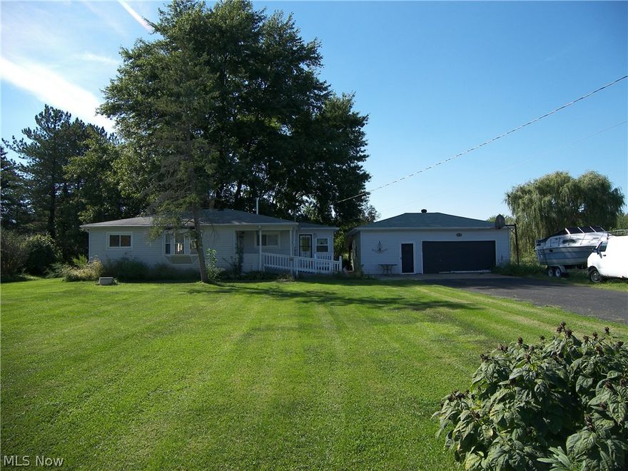 3 Bedroom ranch on approx. 5 acres. Nice treed lot...detached 2car garage with attached room perfect for the handyman or crafty person. Covered lean-to off the back.Your own fruit-bowl with an array of fruit trees scattered around the back yard. Great nature with deer and wild turkey who visit frequently.Room for the 4 wheeler...target practice...a baseball field for the kids...jut depends on what your needs are. Firelands schools...Henrietta Twp...Oberlin mailing address