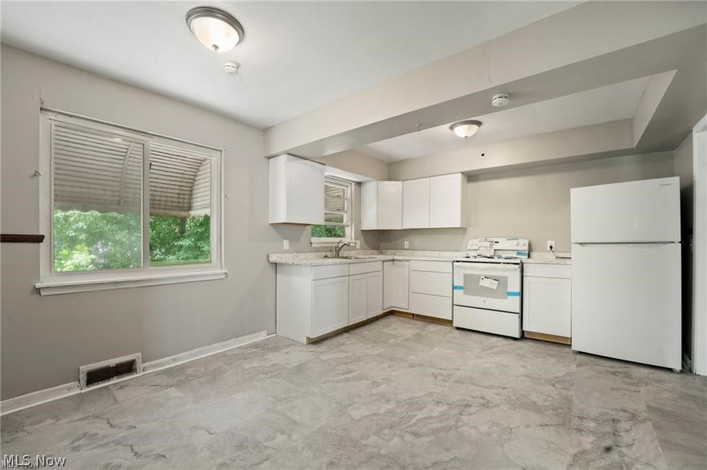 Photo of 14625 Milverton Road, Cleveland, OH 44120 (MLS # 5191097)