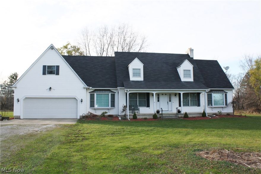 Spaciousness galore! Custom built 4 bedroom, 4 bath cape cod on 2.73 acres of tree lined property, metroparks located directly behind property; large eat-in kitchen w/center island, countertop range, double oven, built in microwave and pantry; first floor laundry off kitchen; dining room with bay window and French doors; 1st floor office adjoining to bath; large living room w/bay window and wood burning fireplace; 1st floor master w/master bath and walk-in closet, 3 additional bedrooms upstairs, with 2 sharing a jack-n-jill bath and one w/own private full bath; 2 additional storage rooms, which could be easily finished into game room or rec room; private balcony, deck overlooking rear of home; plenty of closets, some being walk in closets; full basement w/4 crawl space areas for additional storage. 2 loft areas offering plenty of storage. 17x13 shed. Improvements include sump pump 2015, roof 2012. Hot tub not included. Call for your private showing today!
