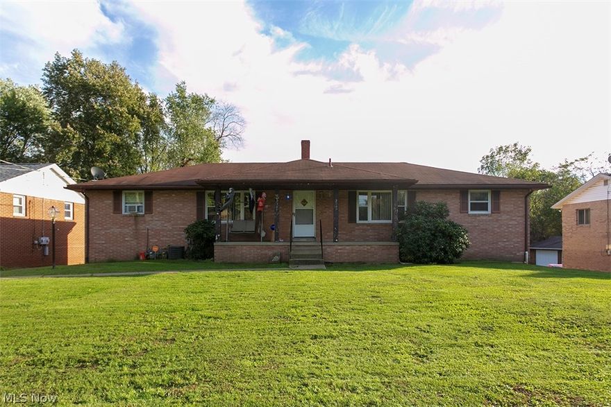 Beautiful Brick Ranch Duplex in Perry Township School District. Great investment or owner occupied property. Two Bedrooms, two baths on each side. Country Kitchen w views of Rear of Property, land, creek, & trees. Living room has picture window. Lower Level Family Room w Built in Bar, Bath, and walk out to patio perfect for grilling. Single Car Garage w Opener and entry into Family Room. Never get wet or have to clean snow off of your car again. Newer carpet in living room and bedrooms. Large living room w coat closet. Double entry into the front. Nice size front and back yard.