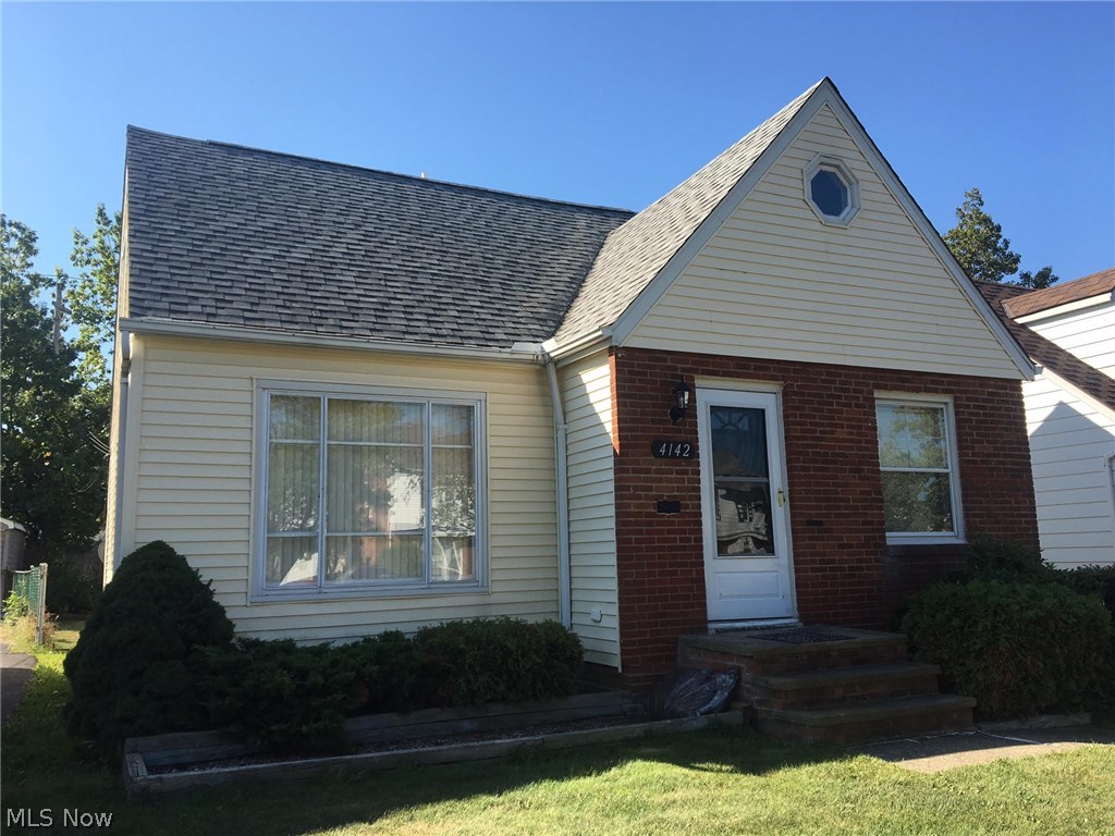 Nicely updated Cape Cod with a one-of-a-kind master suite on the second floor. The huge master bedroom has an enormous closet, skylight, ceiling fan, plus an en-suite master bath with ceramic tile, vanity and skylight. Additional storage on the 2nd floor includes a giant walk-in closet. Brand new kitchen cabinets and counters, appliances included (refrigerator, stove, dishwasher), plus a separate dining area, both with ceramic tile. Gorgeous refinished hardwood floors in the living room and two 1st floor bedrooms. Another full bath, completely remodeled, on the 1st floor. Other features: basement rec room, upgraded electrical, new AC & furnace, newer roof & vinyl siding for worry-free maintenance, ceiling fans, glass block windows. Move right in