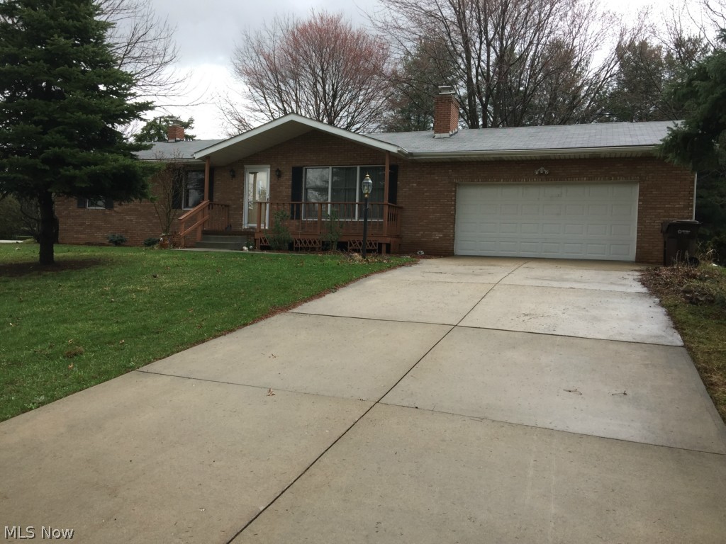 Affordable living in this single story ranch home. This property is located in Hartville, OH and is situated on a half acre lot.This property is well maintained and offers a large eat-in kitchen, living room with gas fire place, three bedrooms and two baths. The lower level has additional square footage and a woodburning fire place.Lower level utility room with an optional space for a work shop. Enjoy the summer evenings "bug free" in your screened in back porch.There is also a spacious deck for grilling. for peace of mind a HOME WARRANTY is included.