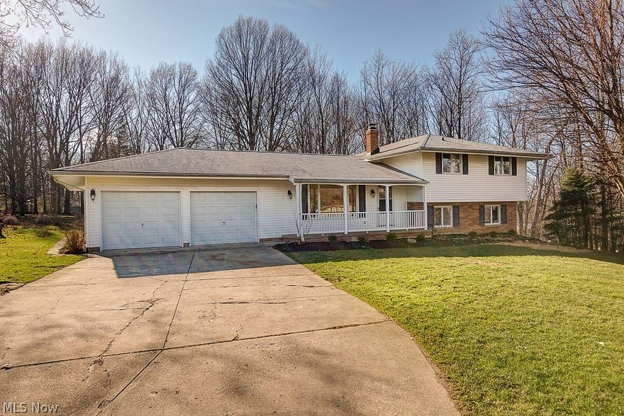 Welcome to this beautifully renovated Split Level in Willoughby Hills, where the country meets the city!  Situated on a one acre lot, this lovely home offers four levels of living space. Step inside to your spacious living room, featuring vaulted ceilings, fresh paint and newly refinished hardwood floors, which lead into the dining area.  The large eat-in kitchen boasts newer espresso cabinetry, granite countertops, and stainless steel appliances.  After a good meal, you can relax in your cozy family room by the warmth of your fireplace.  You also have the option of 2 Master Bedrooms - (1st floor or second) both featuring full baths. The basement includes a carpeted rec room and large laundry/utility room!  MOVE IN READY!!!