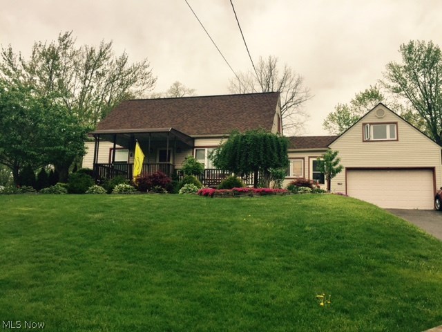 Welcome to 2350 Congo St. in Akron, Ohio. This home has over 1500 sq.ft. which does not include the 32 x 10 recreation room in basement! Master bedroom and full bath are located on the second level with plenty of closet and storage space in addition to a sitting area or study. The first floor has an open floor plan with a completely remodeled kitchen with new appliances and center island, the dining area also features a sitting room overlooking the large back yard with kids playset and basketball court, also, on the first level is the large open living room with a laminate hard wood floor overlooking front deck and perennial gardens. Lower level features a recreation room, a half bath, utility room or kitchen and the laundry room. Outside you'll find the two car garage with stairs leading up to a lofted area for unlimited storage or a kids play room. Other recent updates include: roof (2012), hot water tank (2015) and A.C. in 2013. A one year home warranty is also available f