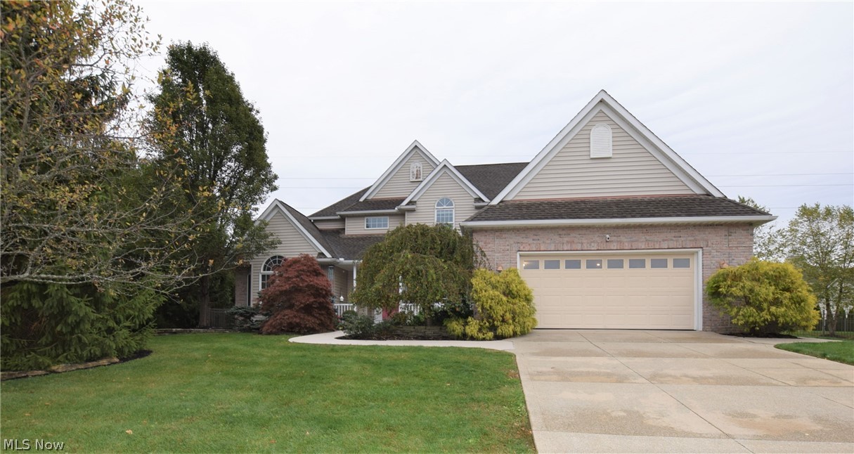This impressive, custom-built Kemppel home in Stow has 4 bedrooms and 3 bathrooms. The living room has dramatic two-story high ceilings with gorgeous windows overlooking the backyard. The eat-in kitchen has an abundance of counter and cabinet space, stainless steel appliances, and an island. Sliding glass doors in the kitchen lead to the backyard patio. The Master Suite has gorgeous Cathedral ceilings, lots of windows, and recessed lighting. Three-car tandem
garage. Don’t let this incredible home get away!
