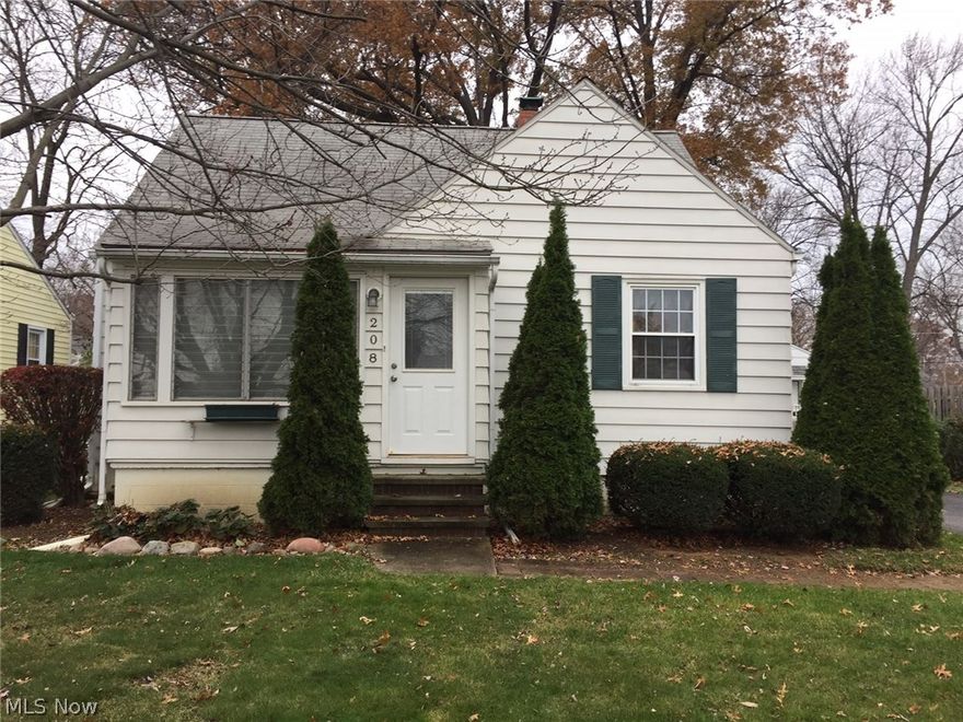 This 3 bedroom 1.5 bath bungalow has been well cared for! The covered outdoor front porch opens up to an enclosed front carpeted sunroom. Nice open floor plan inside. Living room and two bedrooms on the first floor feature hardwood flooring. Kitchen has new ceramic tile flooring, and comes with all appliances. Full bathroom on first floor as well. Upstairs is the master bedroom that features pergo flooring and 1/2 bath with new vanity. The full basement has been waterproofed, and has a shower, laundry area-washer and dryer stay, and newer furnace. One car detached garage with new door. Covered back patio. Call today for your private showing!